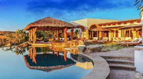 Tranquil Villa on a Golf Course with Open-Concept Living, Infinity Pool, & Jacuzzi